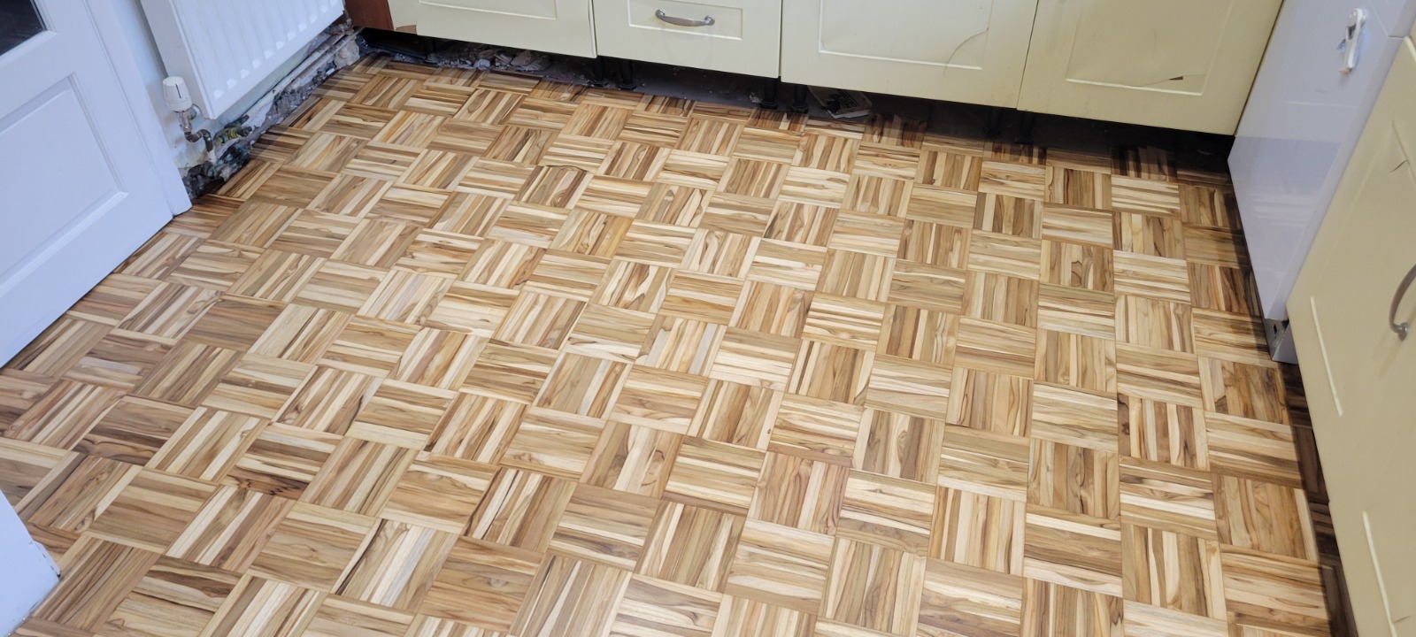 Wood Floor Sanding in Sydenham on light oak mosaic parquet kitchen flooring with a freshly restored natural timber finish
