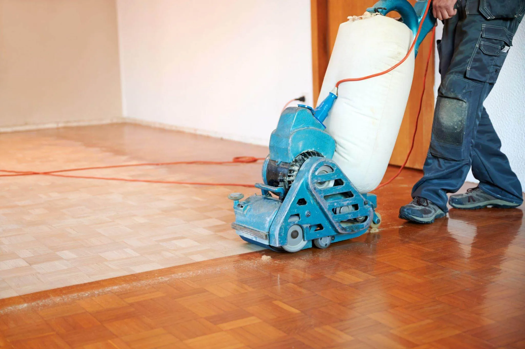 Wood Floor Sanding in Sydenham on oak parquet block flooring with a professional dustless sanding machine during restoration