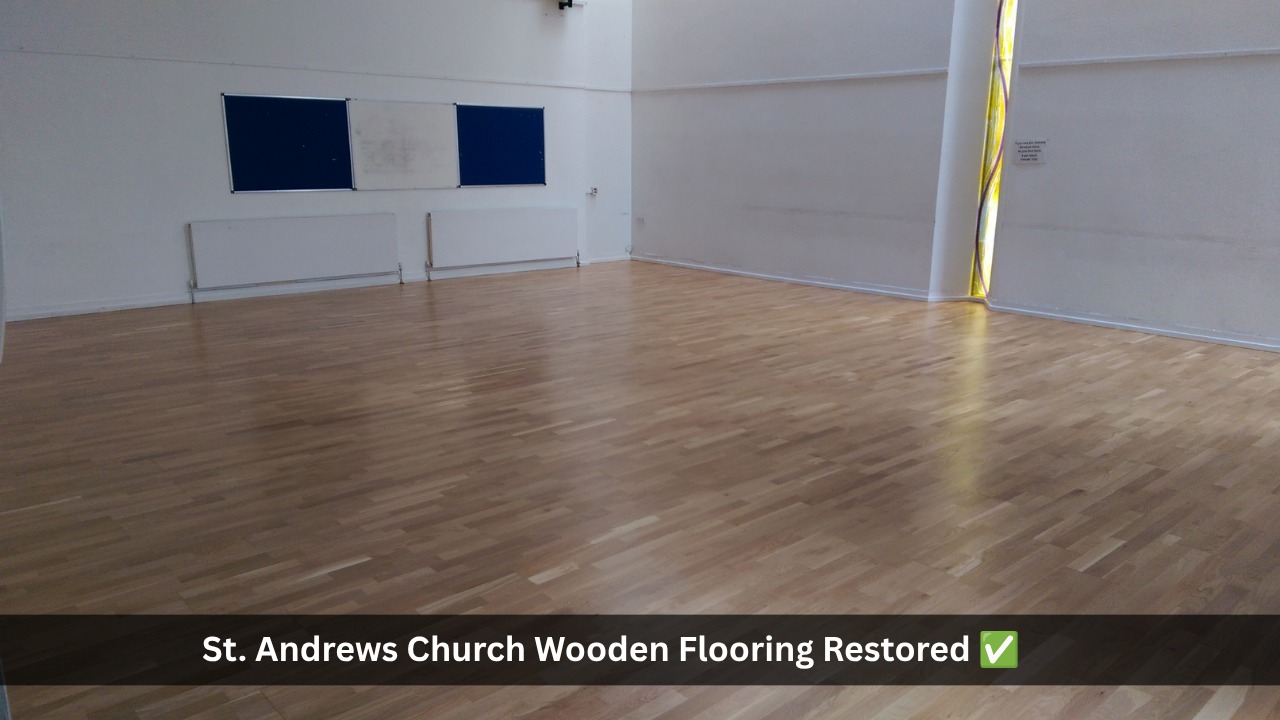 Restored light wooden flooring in St. Andrews Church hall after professional sanding and refinishing, showing a smooth, polished surface in a bright empty room with white walls and notice boards